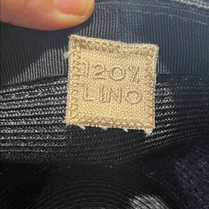 120% Lino black hat white stitching